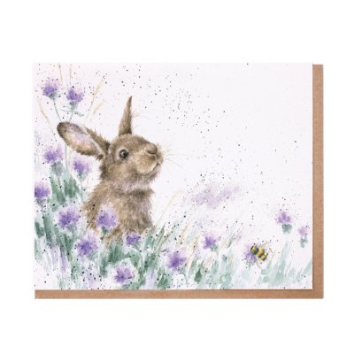 Rabbit amongst purple flowers greeting card
