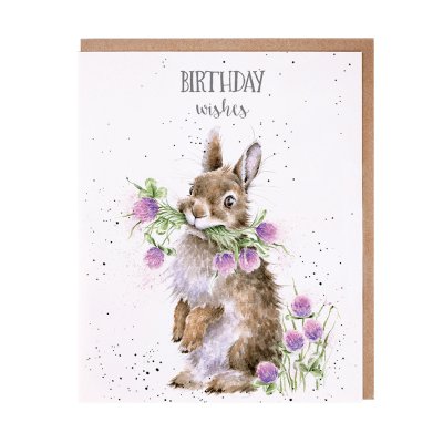 Rabbit with flowers in its mouth birthday card