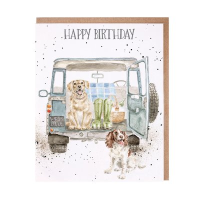 Labrador and springer spaniel in a Land rover birthday card