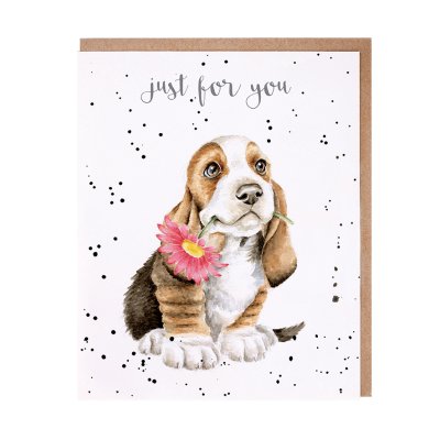 Basset Hound puppy with a flower in its mouth just for you card