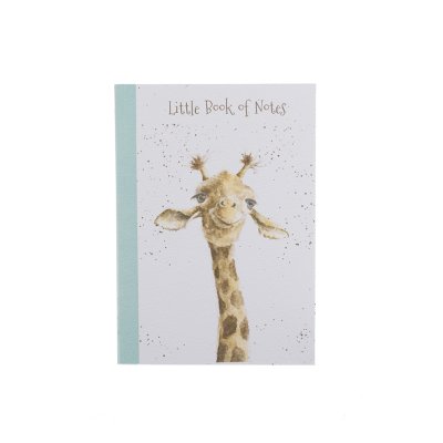 A giraffes head and neck on an A6 paperback notebook